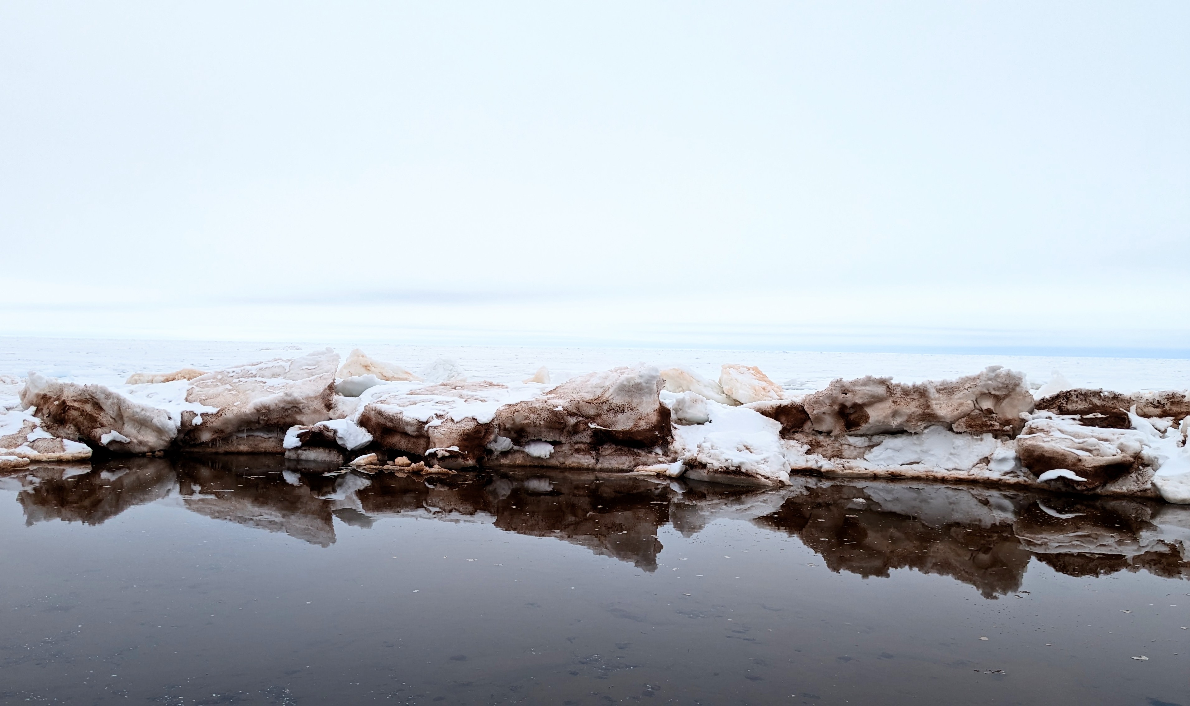 Water and ice at the seashore.