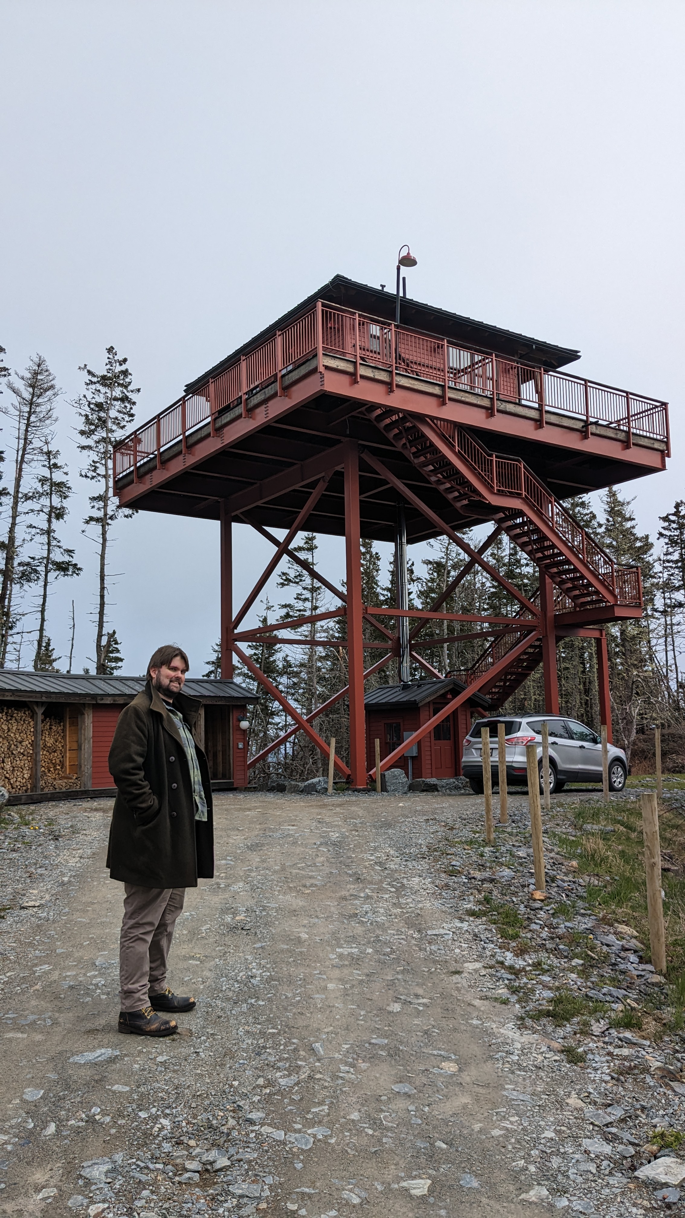 Magill at the base of the fire watch tower.